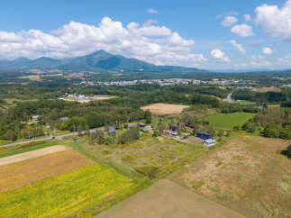 Discover this stunning property nestled amidst rolling hills and picturesque farmland, offering breathtaking views of distant mountains.