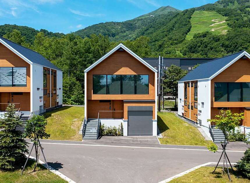 Discover modern living in this stunning property featuring a sleek, contemporary design with warm wood accents and expansive windows that invite natural light.