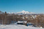 Experience the serene beauty of a winter wonderland with this picturesque property.