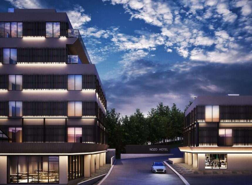 Experience modern luxury at NOZO HOTEL, a stunning architectural marvel designed for comfort and style.