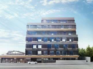 Experience modern luxury at this stunning hotel, featuring a sleek, multi-story facade with expansive windows and balconies offering city or garden views.