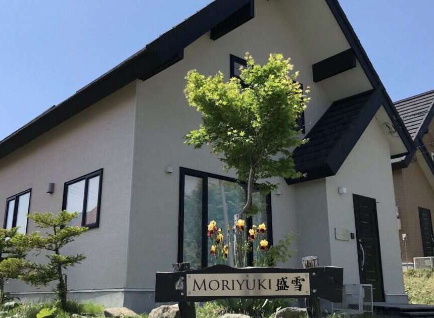 Discover this charming property featuring a modern exterior with clean lines and a dark roof.