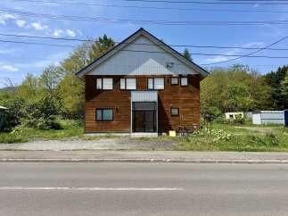 Discover this charming wooden-clad property, perfect for a serene retreat or a unique business venture.