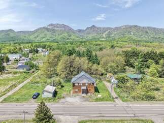 Nestled amidst lush greenery and rolling hills, this charming property offers a serene escape with stunning mountain views.