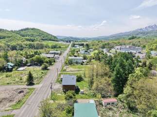 Discover this charming property nestled amidst lush greenery and rolling hills, offering a serene escape.