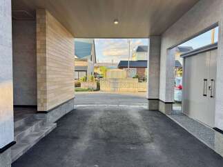 Discover this charming property featuring a covered entryway with modern tiling and a spacious driveway perfect for parking.