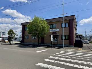 Discover this commercial property featuring a prominent sign for 'Kyowa Sogo Management Co.