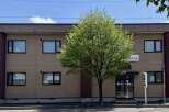 This commercial building offers a prime location with excellent visibility.