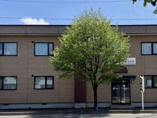 This commercial building offers a prime location with excellent visibility.