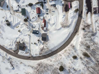 Discover this charming winter wonderland property, perfect for a cozy getaway or a year-round residence.