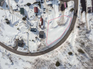 Discover this charming winter wonderland property, perfect for a cozy getaway or a year-round residence.
