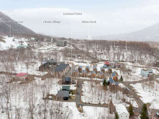 Discover this stunning property nestled in a serene winter landscape, offering breathtaking mountain views and proximity to the Higashiyama Ski Area.