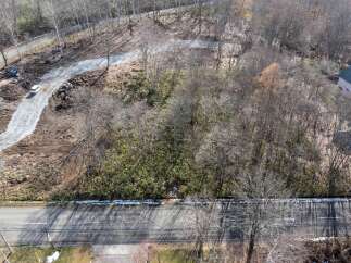 Discover this prime real estate opportunity with a cleared lot ready for development.
