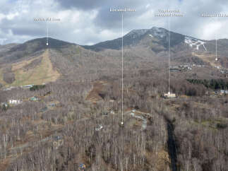 Discover the serene beauty of this mountainous landscape, perfect for outdoor enthusiasts and nature lovers.