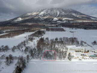 Discover this prime property nestled in a serene, snow-covered landscape, offering a unique opportunity for development or investment.