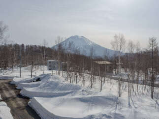 Experience the serene beauty of a winter wonderland with this stunning property.