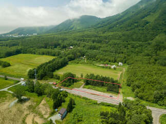Discover this prime parcel of land nestled amidst lush greenery and rolling hills, offering a serene escape.