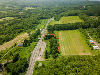Discover this prime parcel of land, perfectly situated for development or agricultural use.