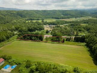 Discover this expansive parcel of land, perfect for your next development or agricultural venture.