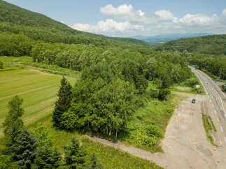 Discover this stunning property nestled amidst lush greenery and rolling hills.