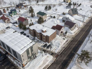 Discover this charming property nestled in a serene, snow-covered landscape.