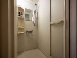 Discover a compact and functional bathroom space, perfect for efficient living.