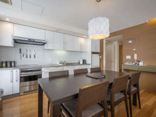 Experience modern living in this beautifully appointed kitchen and dining area.