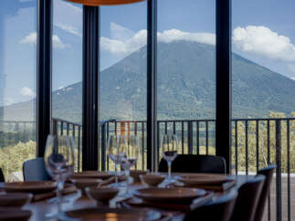 Experience breathtaking mountain views from this exquisite dining area, perfect for intimate gatherings or grand celebrations.
