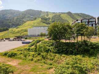Discover modern luxury nestled in a scenic mountain landscape.