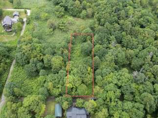 Discover this expansive wooded lot, perfect for building your dream home or a secluded getaway.