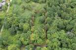 Discover this prime parcel of land, nestled within a lush, wooded landscape.