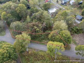 Discover this picturesque wooded lot, perfect for building your dream home amidst nature's beauty.