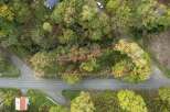 Discover this prime parcel of land, ideally situated adjacent to a paved road, offering excellent accessibility.