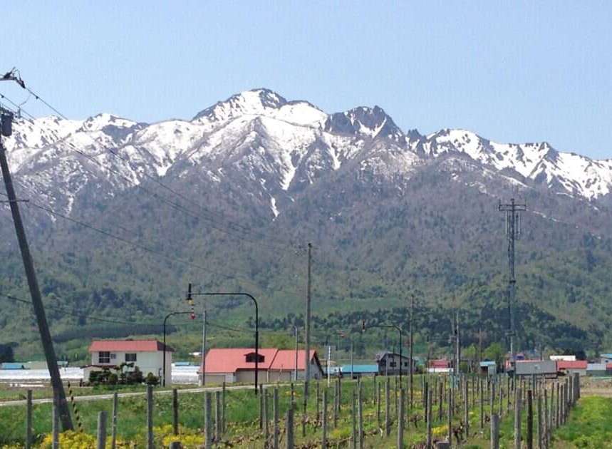 Discover serene living with this picturesque property, offering breathtaking views of snow-capped mountains.