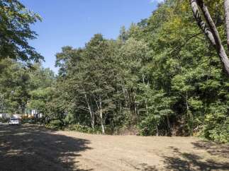 Discover this prime real estate opportunity, featuring a cleared, level lot perfect for building your dream home.