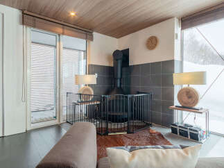 Experience cozy living with this modern fireplace, perfect for chilly evenings.