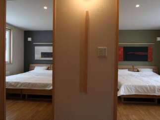Discover this unique property featuring two distinct bedrooms, each offering a serene and comfortable retreat.