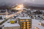 Experience the charm of a winter wonderland with this stunning property nestled in a snowy mountain town.