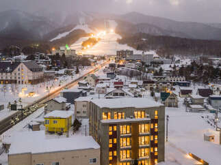 Experience the charm of a winter wonderland with this stunning property nestled in a snowy mountain town.