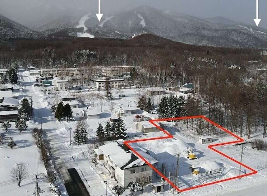 Discover this prime real estate opportunity nestled in a picturesque snowy landscape, offering a unique blend of natural beauty and convenient living.