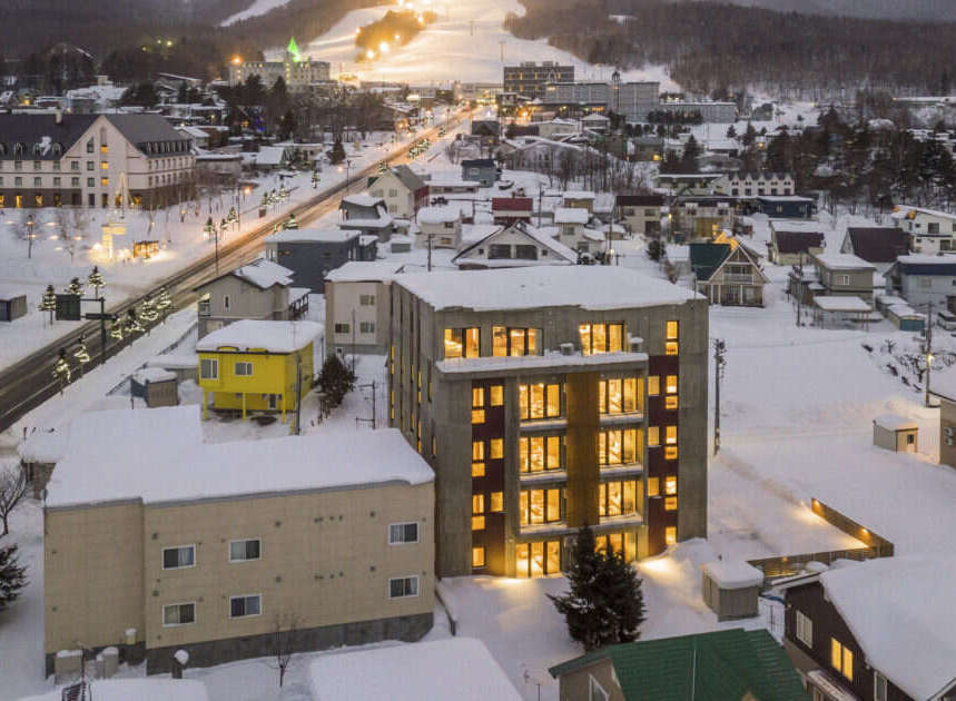 Experience the charm of a winter wonderland from this stunning property, nestled in a snow-covered town.