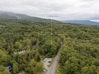 Discover this stunning property nestled amidst a lush, green forest, offering unparalleled privacy and tranquility.