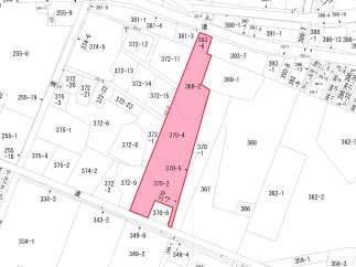 Discover this prime real estate opportunity featuring a prominent parcel highlighted in pink, offering excellent potential for development.