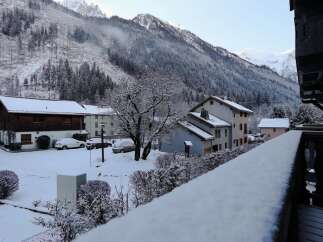 Experience the charm of a winter wonderland with this picturesque property nestled in the snowy mountains.