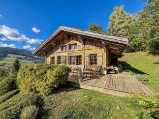 Experience rustic charm in this stunning wooden chalet nestled amidst breathtaking mountain scenery.