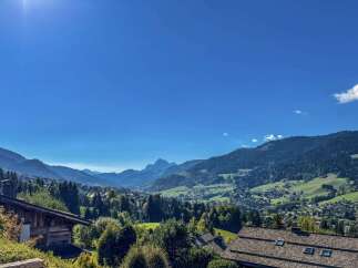 Experience breathtaking mountain views from this charming property nestled in a picturesque valley.