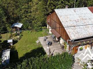 Discover this charming property nestled in a serene, wooded setting, perfect for those seeking tranquility.