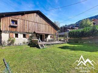 Experience the charm of this rustic wooden chalet, nestled in a serene mountain setting.