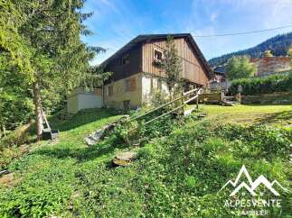 Nestled in a serene mountain landscape, this charming property offers a rustic retreat with stunning natural surroundings.