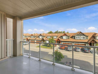 Enjoy the fresh air and scenic views from this private balcony, perfect for morning coffee or evening relaxation.